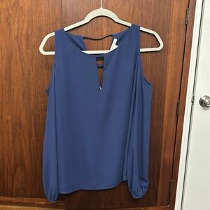 Women’s cold shoulder blouse in a bluish purple
